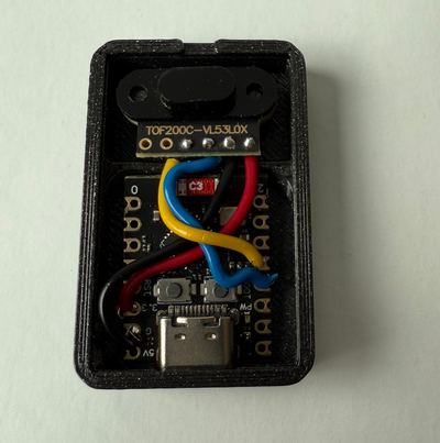 Insert TOF200C Sensor and ESP32 C3 Supermini Development Board into Enclosure