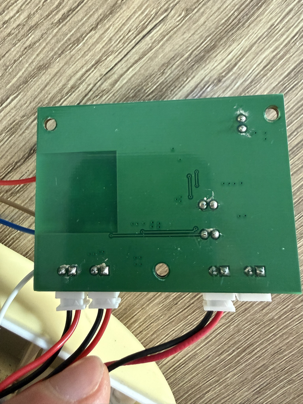 Back side of the Guan Sen controller PCB showing the CB3S module pads