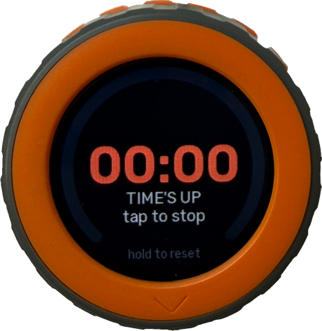 M5Stack Dial timer at zero: 00:00 in red, TIME'S UP, tap to stop