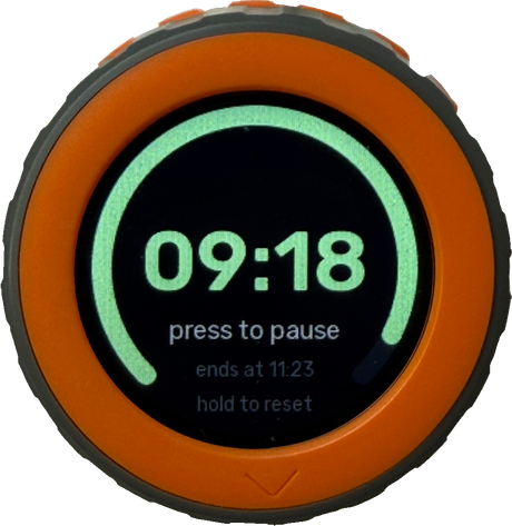 M5Stack Dial timer running: 09:18 in green, press to pause, ends at 11:23