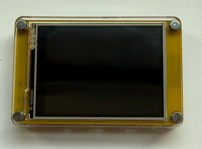 Elecrow ESP32 Miner LCD Display in its included acrylic case, front view