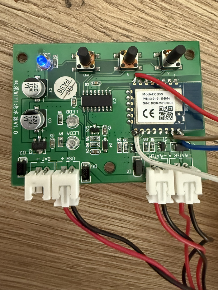 Fine magnet wires soldered to the CB3S module pads (TX, RX, GND, VCC) for serial flashing
